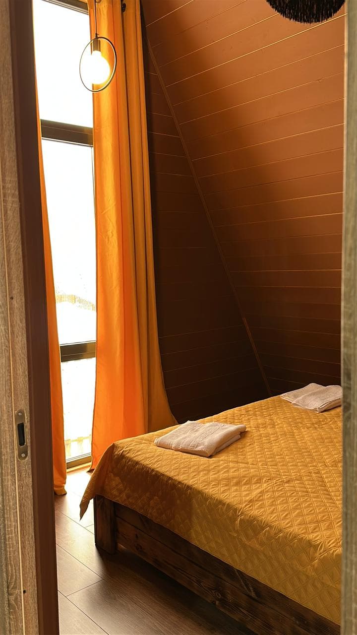 Уютная спальня с панорамным окном